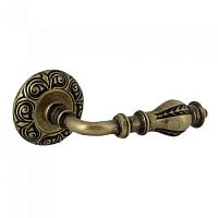Дверн.ручка на кругл.розетке,(д.60мм)ММ 1404.26 ИБИЦА антич.латунь Дверн.ручка на кругл.розетке,(д.60мм)ММ 1404.26 ИБИЦА антич.латунь